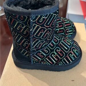 UGG Black Boots with Vibrant Logo Design